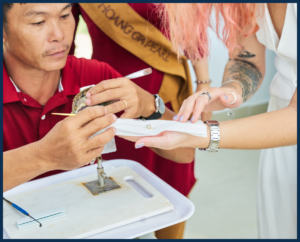 The suspenseful moment as a precious pearl is unveiled from the oyster by a skilled technician at the Hoang Gia Pearl Museum.